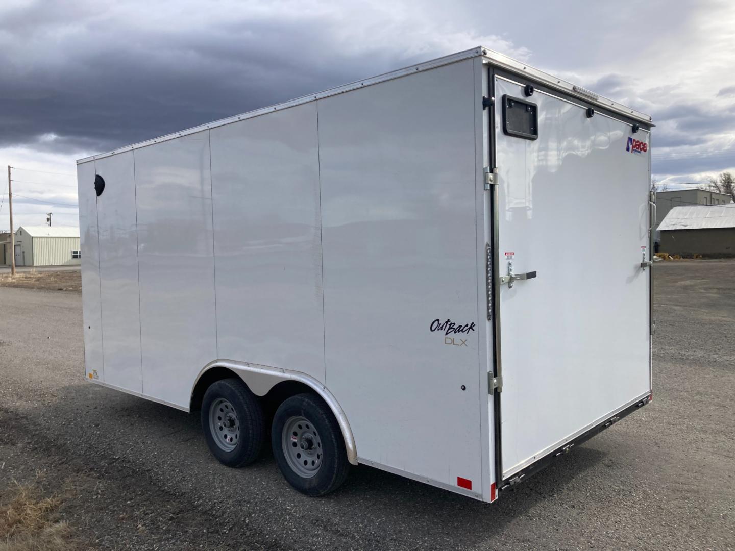 2024 , located at 310 West 1st Ave, Big Timber, MT, 59011, (406) 860-8510, 45.833511, -109.957809 - New Pace American Outback Deluxe 81/2 x 16 Enclosed Cargo, 7k GVW, 81" rear door opening height with beavertail, bonded sides (no screws), v-nose, rear ramp door, 32" side door, (2) 3.5k axles, electric brakes on both axles, LED lights, high performance floor and sidewall material, 16" on center sid - Photo#4